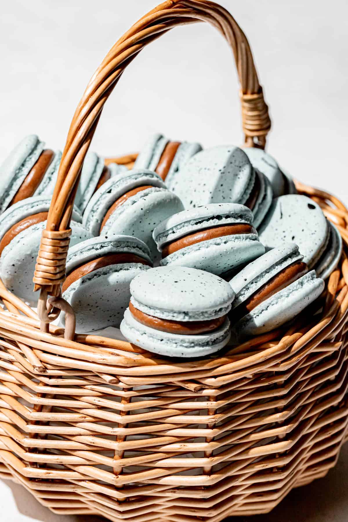 Robin's Egg Macarons in basket.