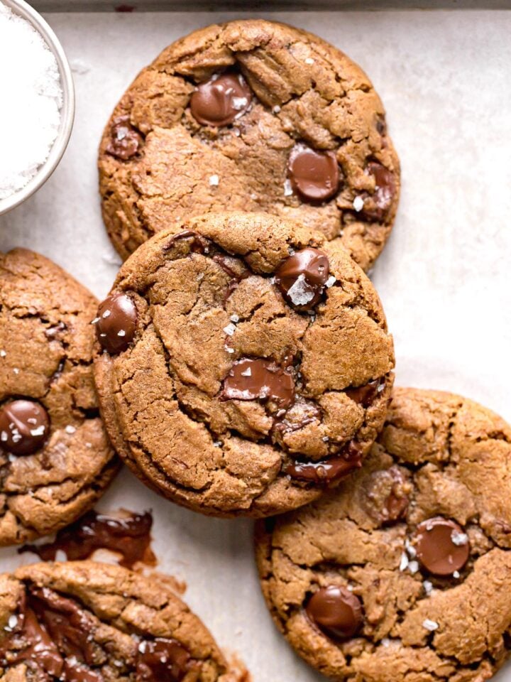 espresso chocolate chip cookies on parchment lined baking sheet