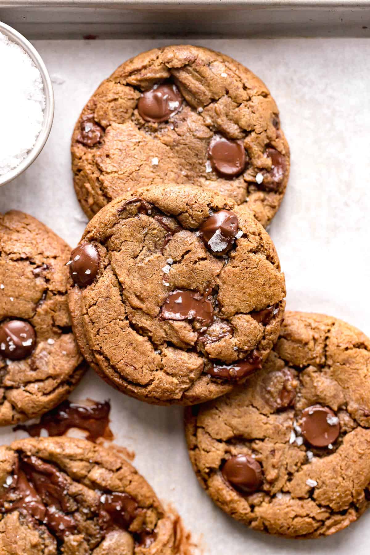 espresso chocolate chip cookies on parchment lined baking sheet.