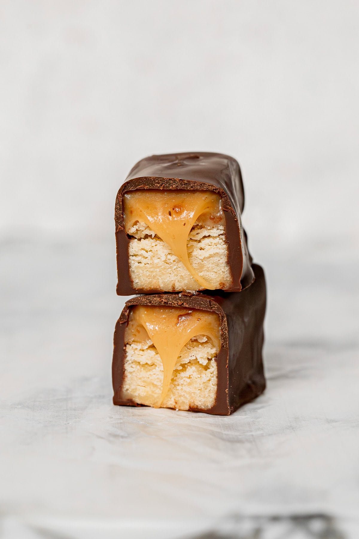 homemade Twix bar cut in half and stacked. 