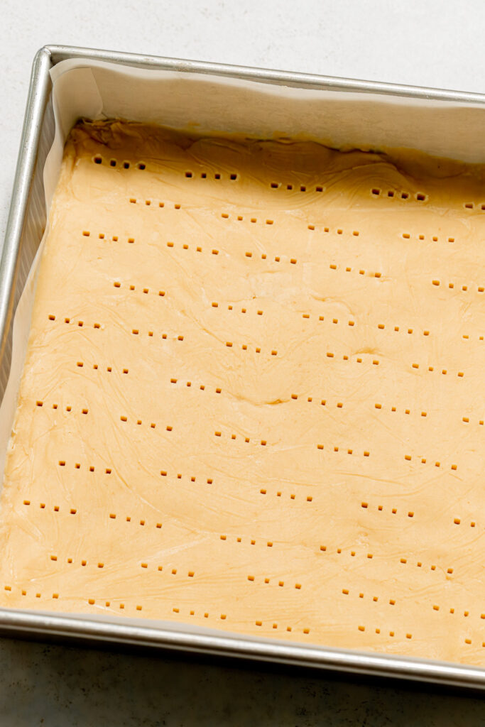 shortbread dough in square pan.