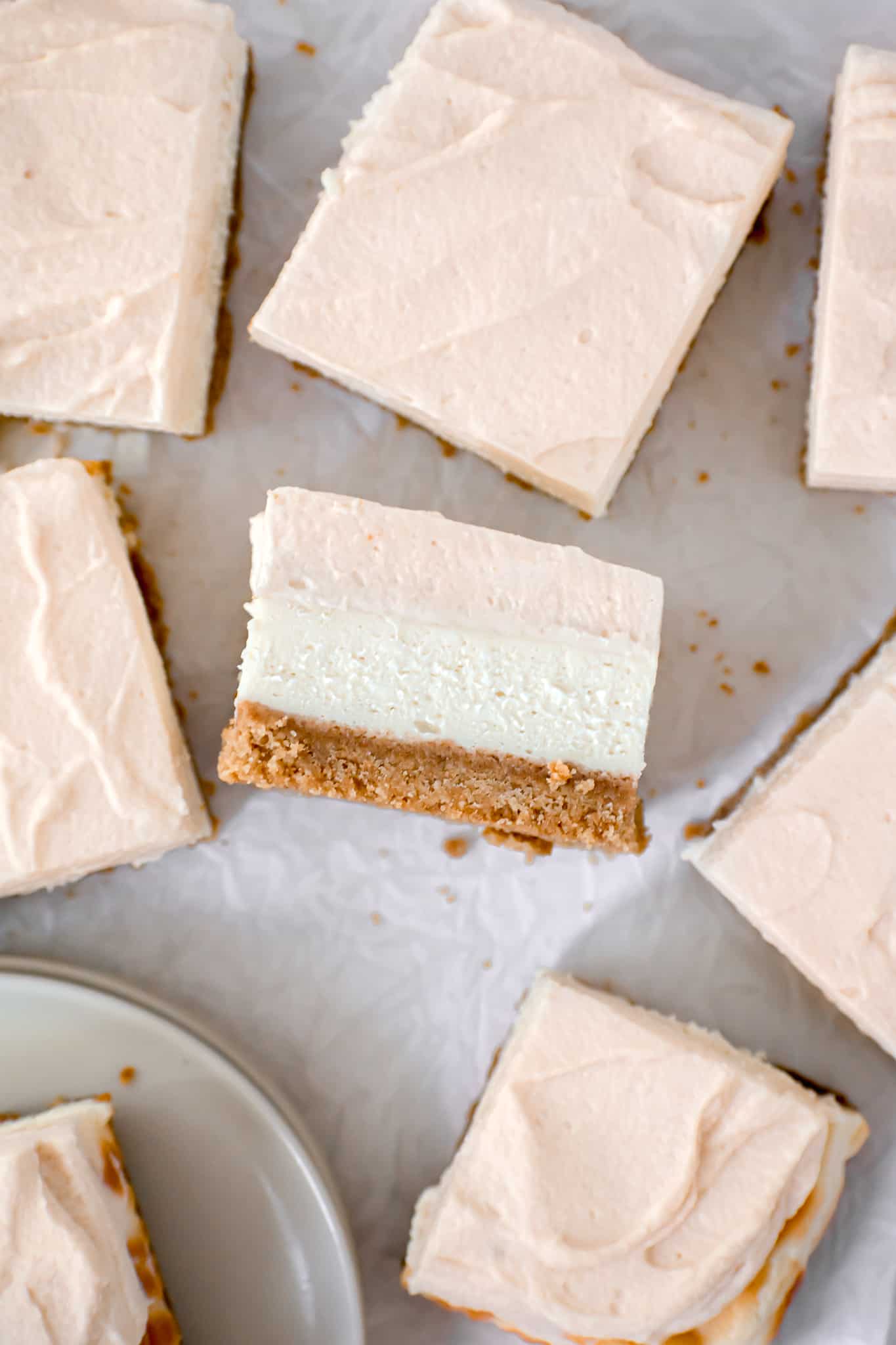 vanilla cheesecake bars with caramel mousse.