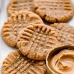 flourless peanut butter cookies piled in small baking sheet