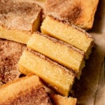 snickerdoodle cookie bars on parchment paper.