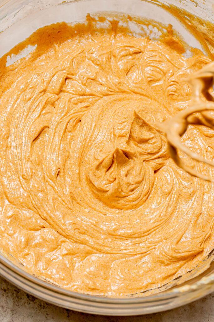 pumpkin swiss meringue buttercream in bowl.
