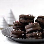 chocolate peppermint sable cookies piled on plate
