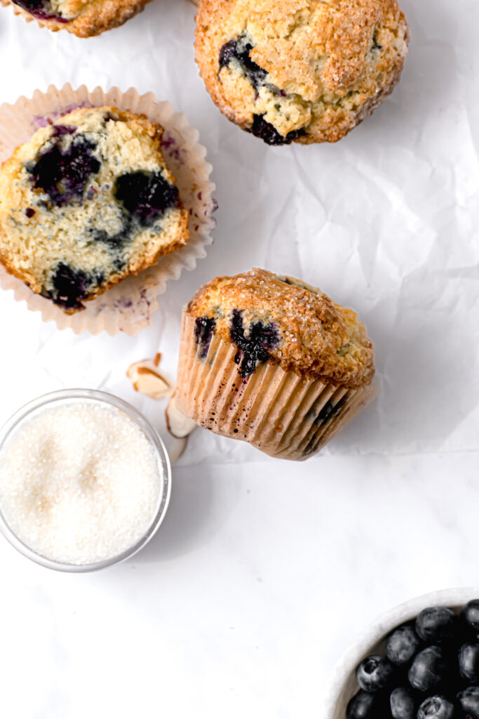 small batch buttermilk blueberry muffins on parchment paper