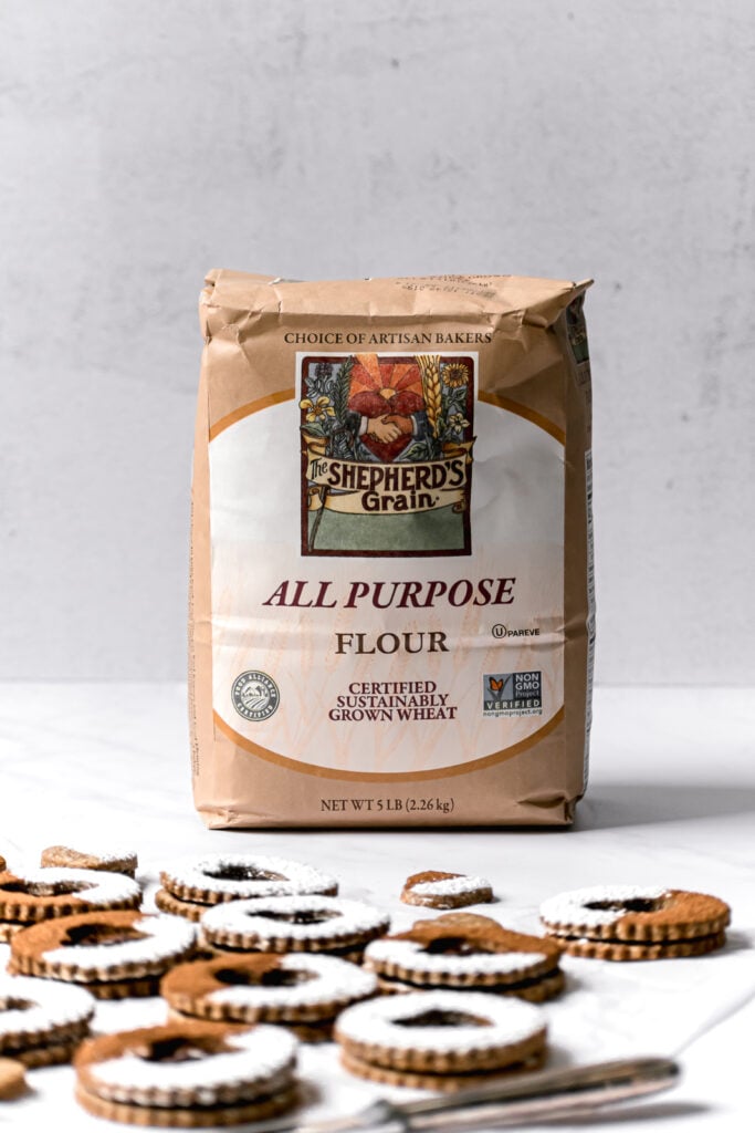 bag of shepherd's grain flour with linzer cookies