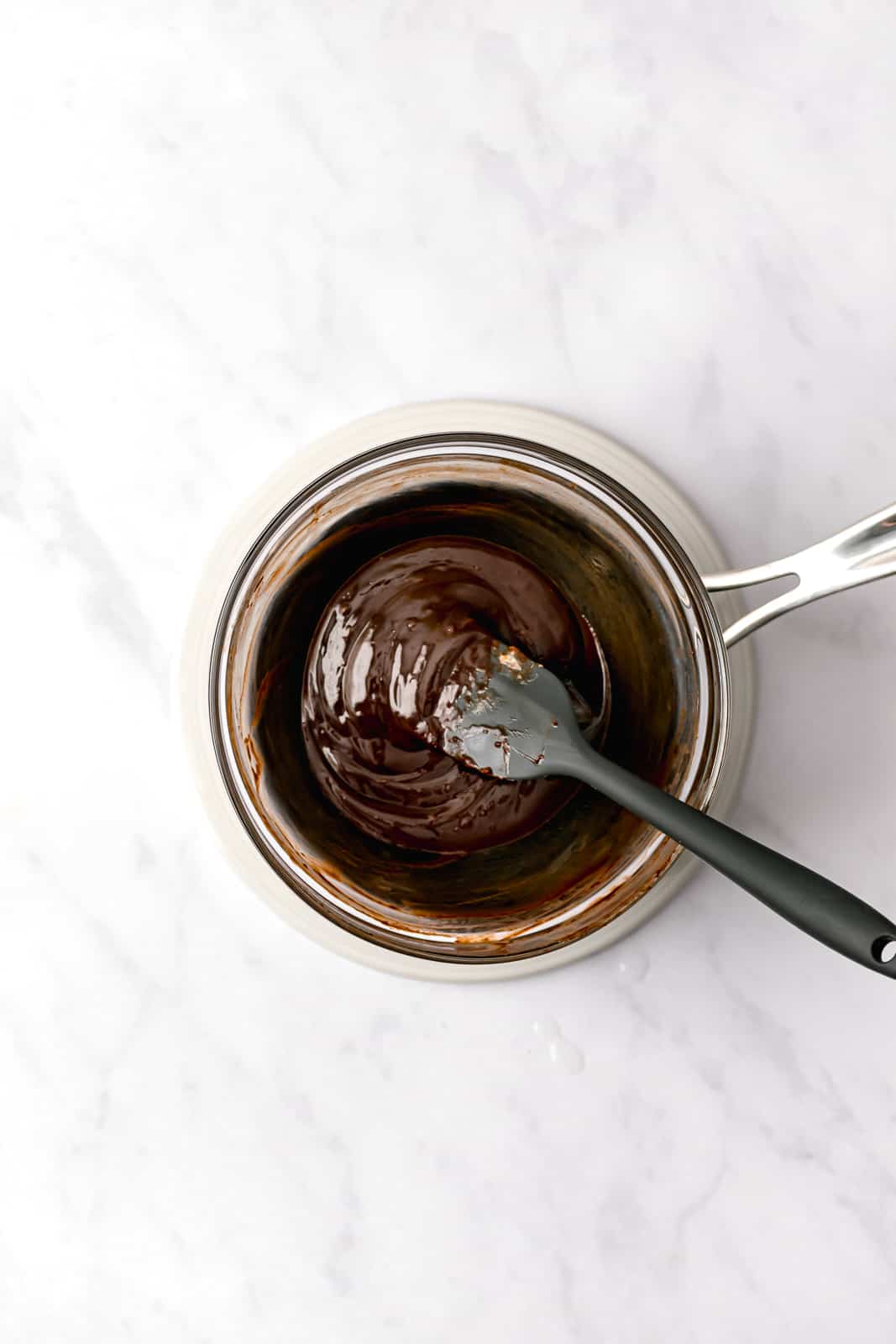 chocolate batter ingredients over a double boiler.
