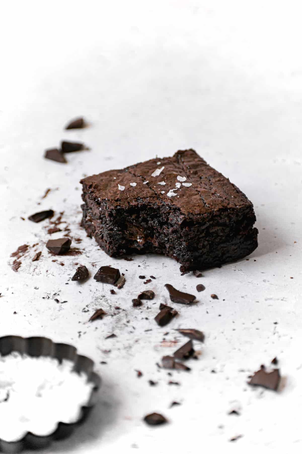 one brownie with bite taken out.