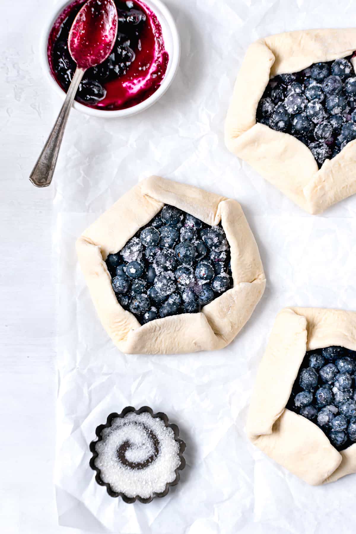 unbaked mini blueberry galettes.