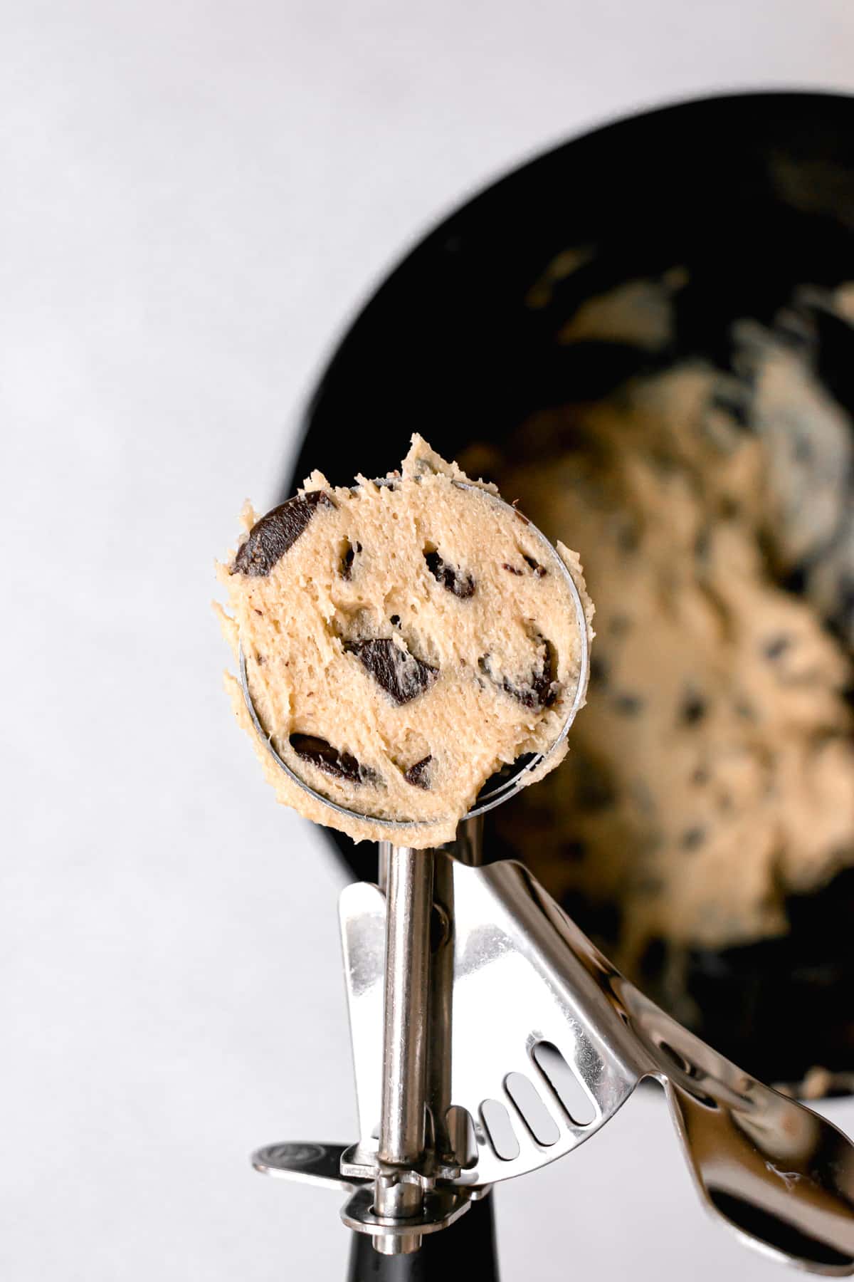 cookie dough scoop with gluten free chocolate chip cookie dough.