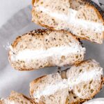new york style bagels with cream cheese on plate