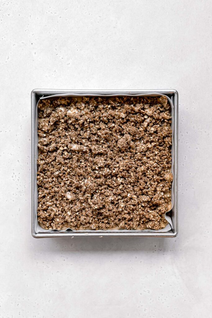 brown sugar oat streusel added on top of batter in square pan