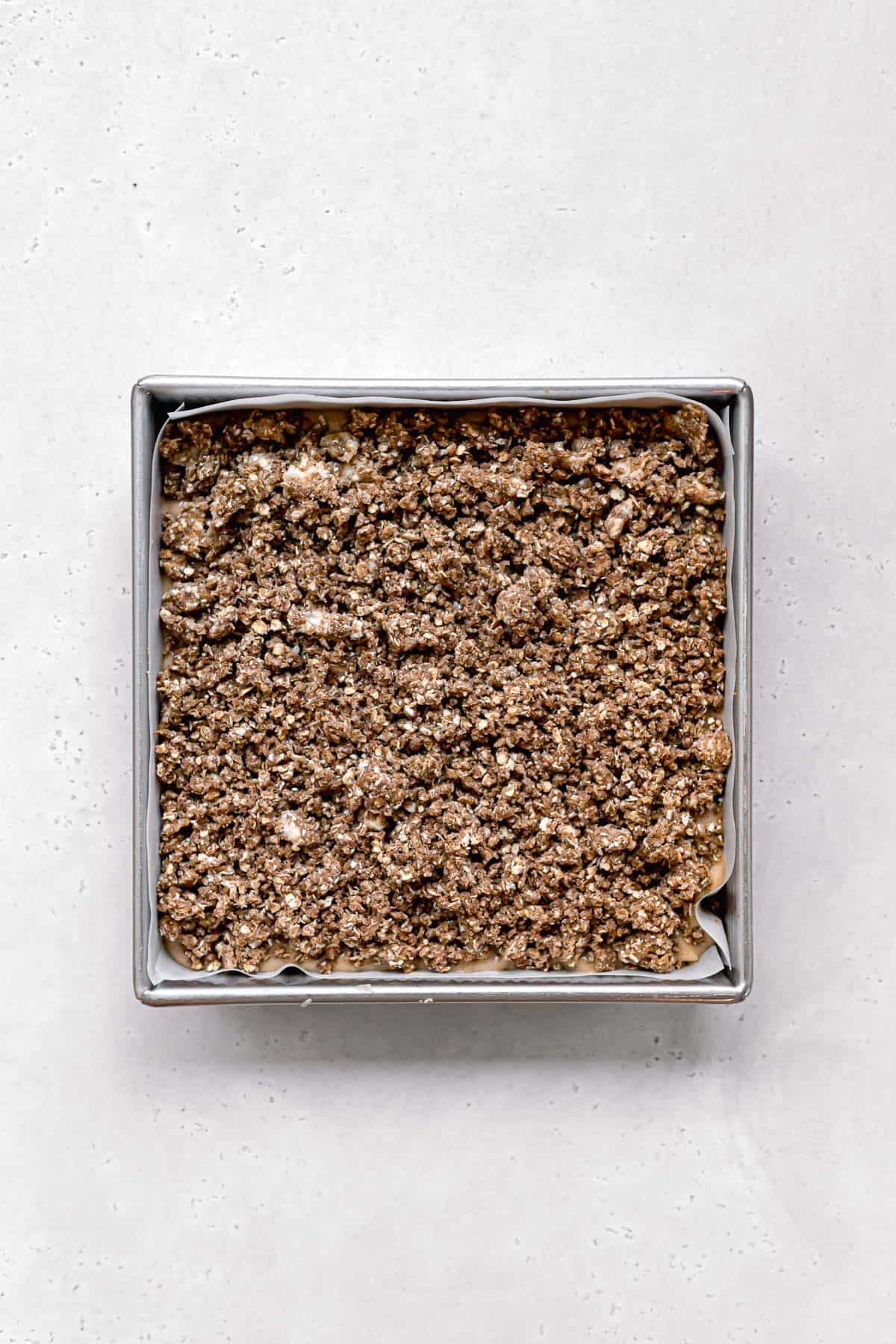 brown sugar oat streusel added on top of batter in square pan.