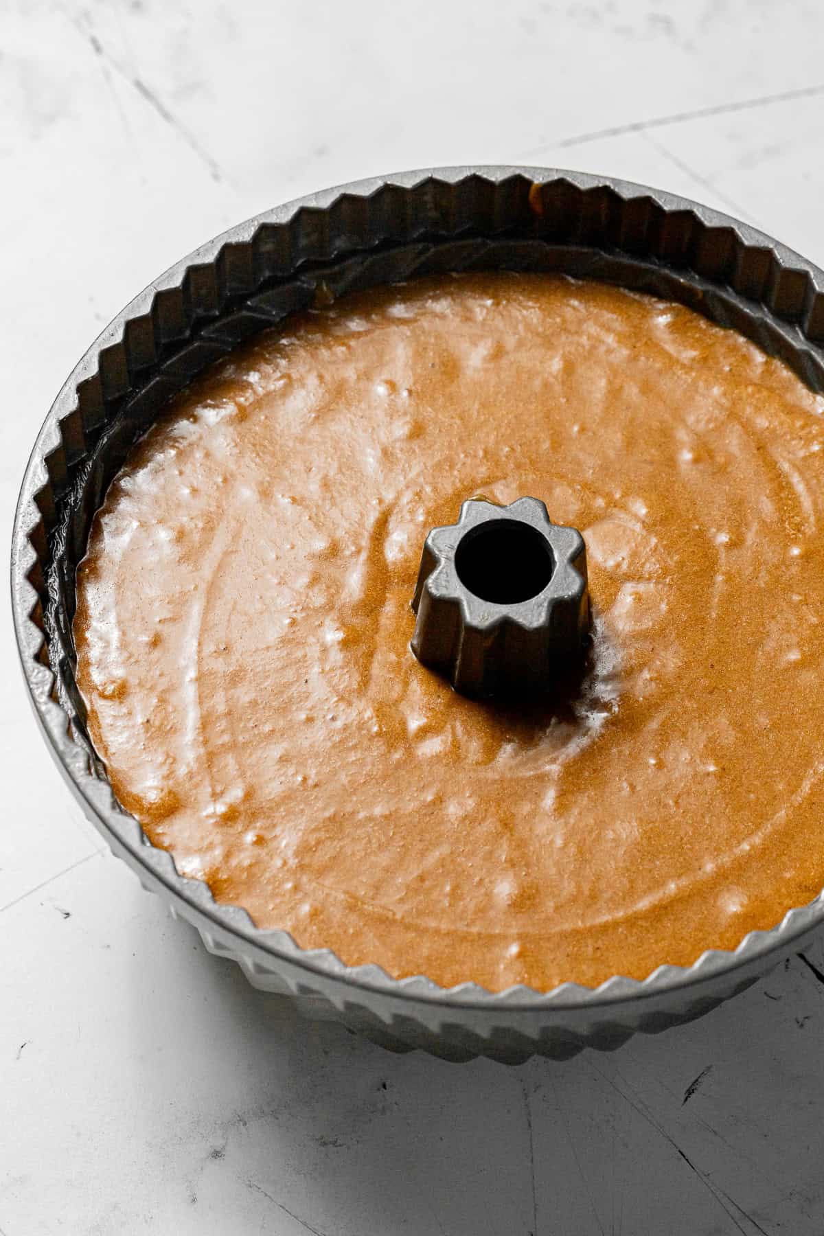 cake batter in bundt pan.