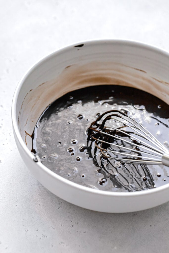 chocolate donut batter in white bowl