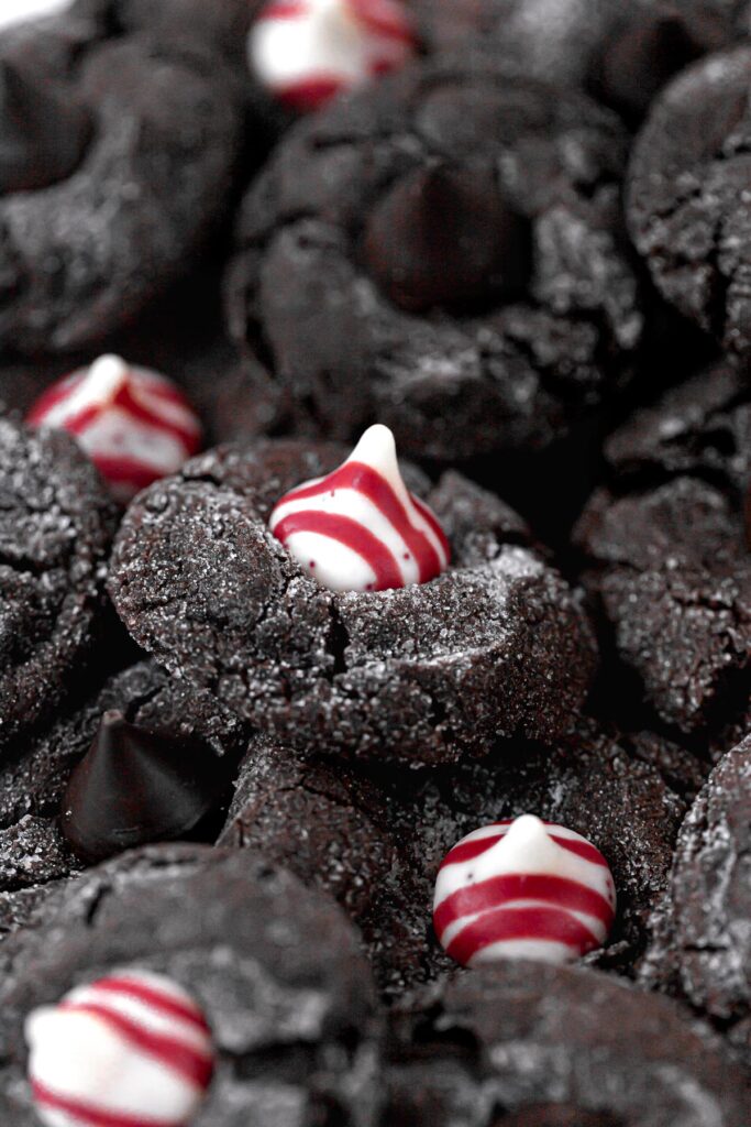 chocolate peppermint kiss cookies in a pile