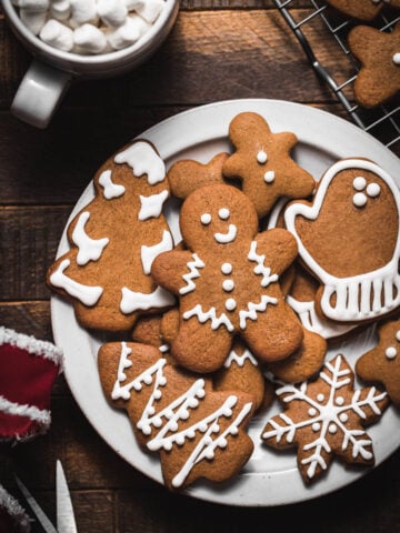 gingerbread cutout cookies on white plate