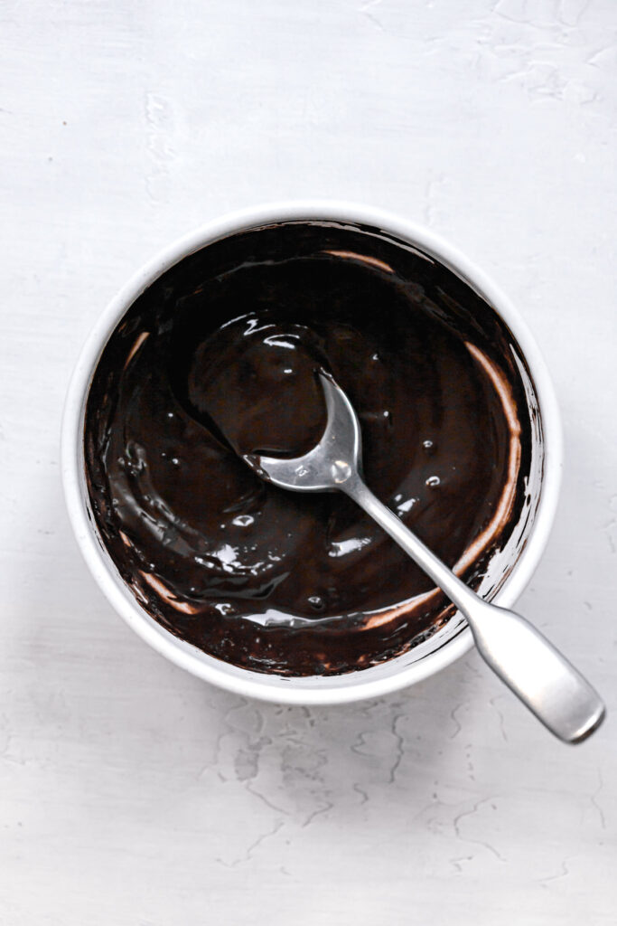 bloomed cocoa powder mixture in white bowl