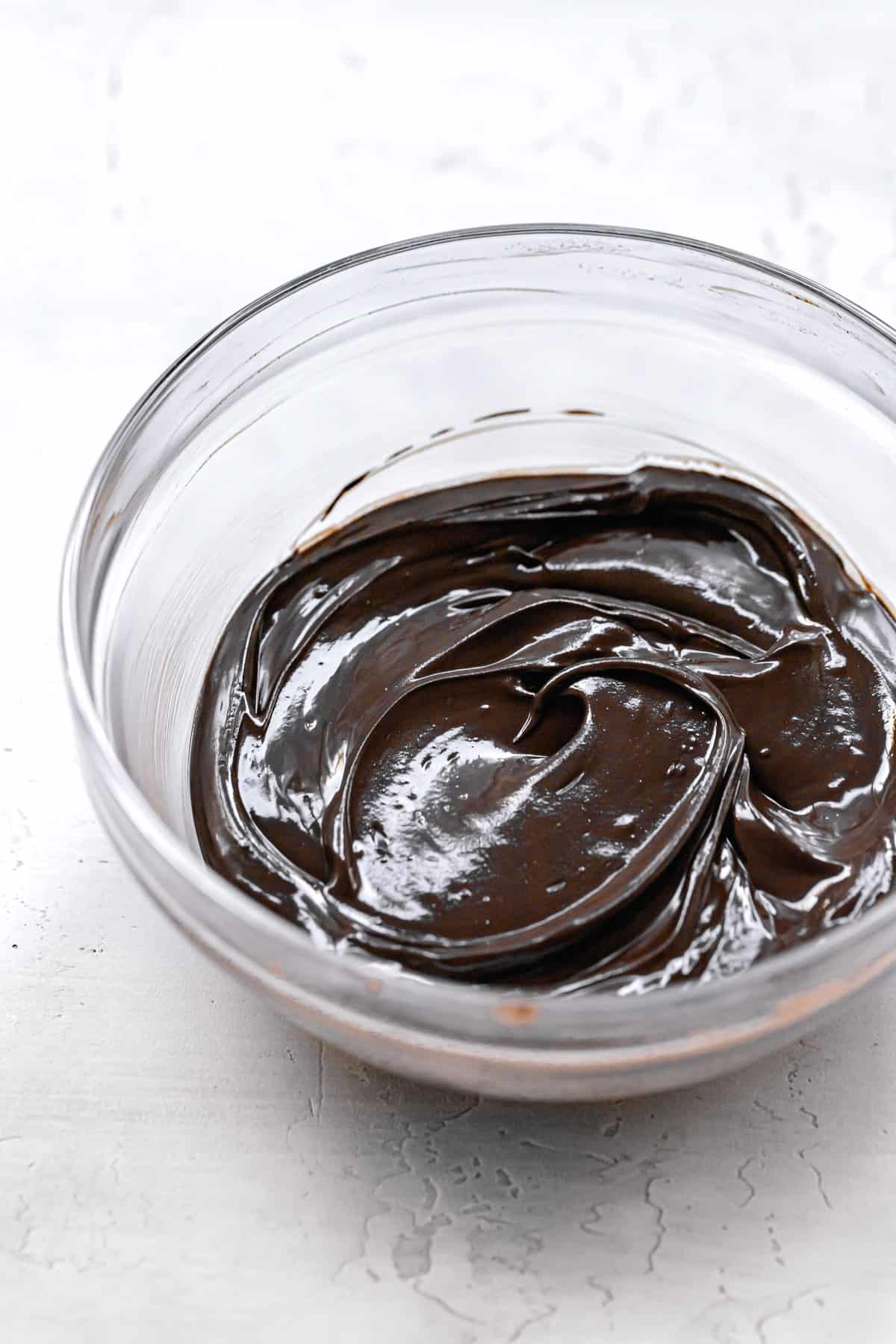 chocolate butter mixture in glass bowl.