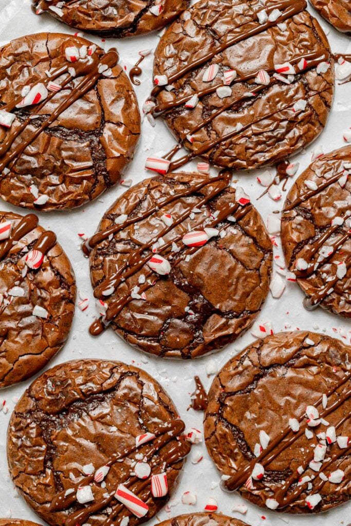 Peppermint Mocha Cookies decorated on parchment paper.