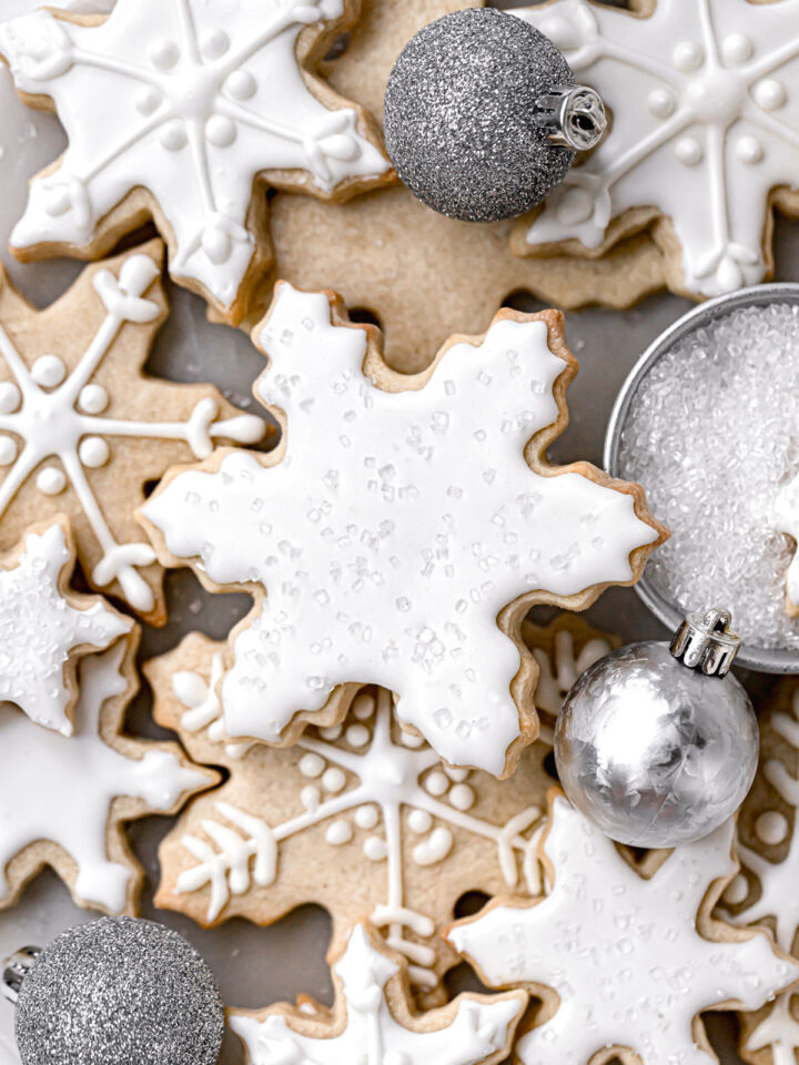 snowflake sugar cookies decorated with white royal icing