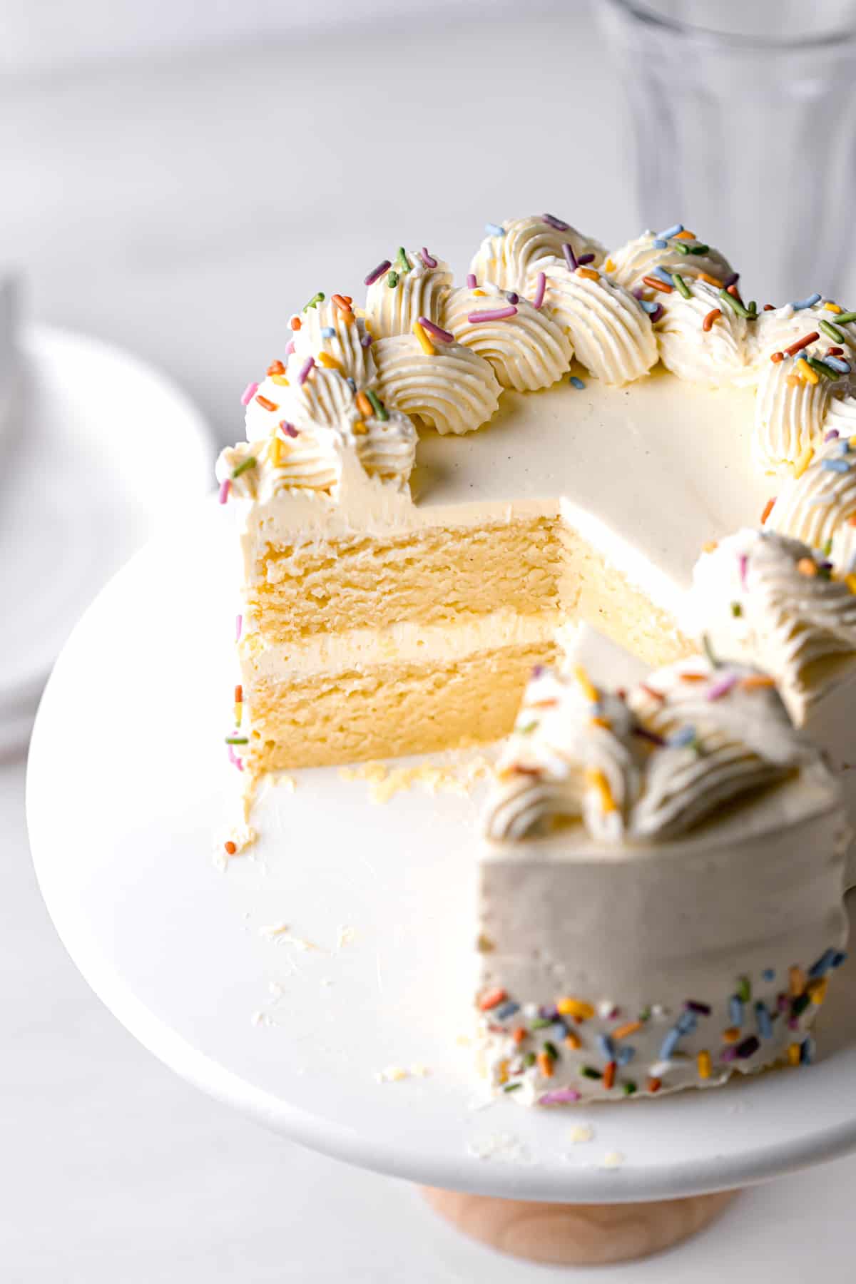 vanilla swiss meringue buttercream decorated on vanilla layer cake.