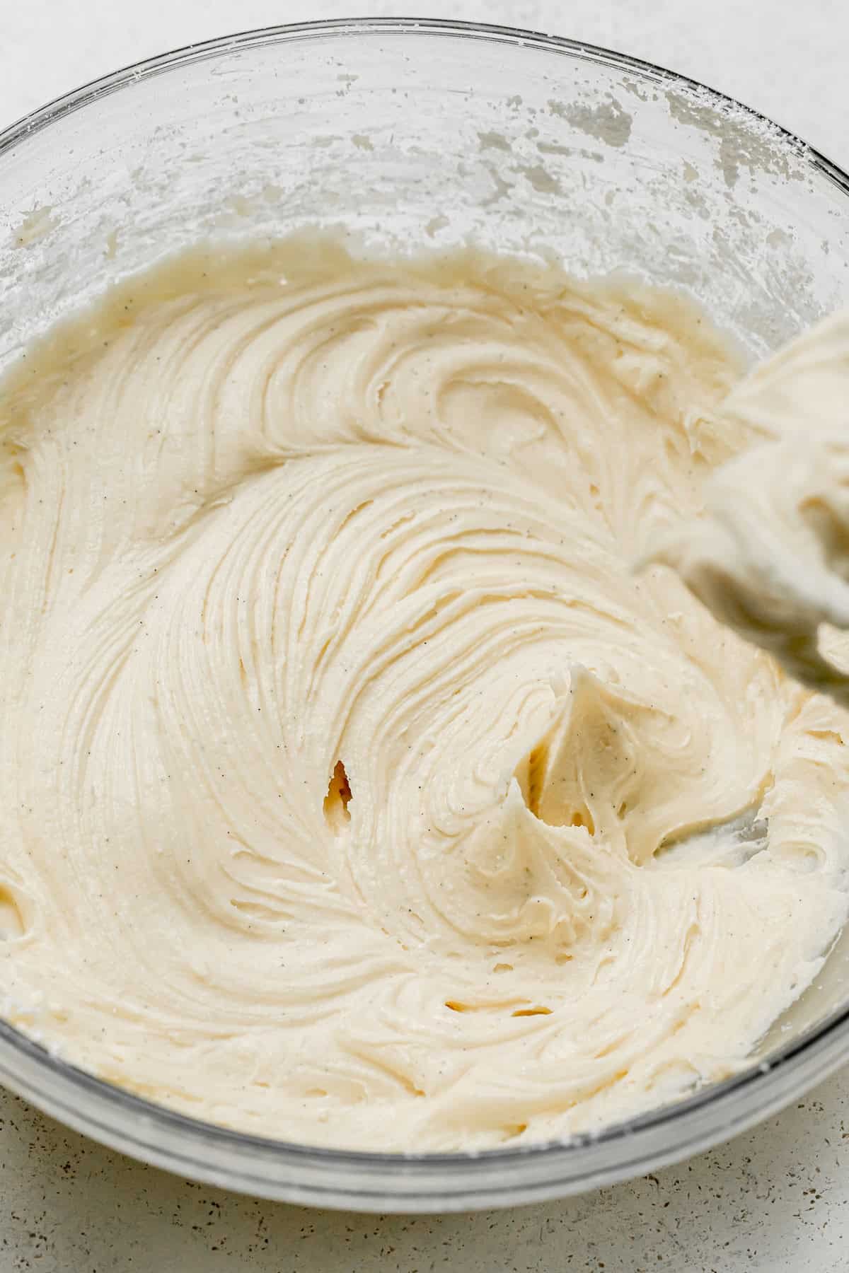 cream cheese frosting in bowl.