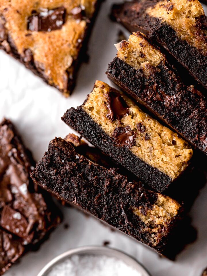 brownie blondies lined up on their sides to show inside texture