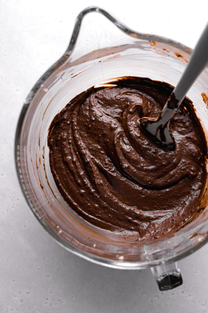 chocolate sour cream pound cake batter in glass bowl