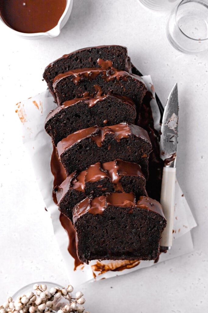 double chocolate pound cake sliced on parchment