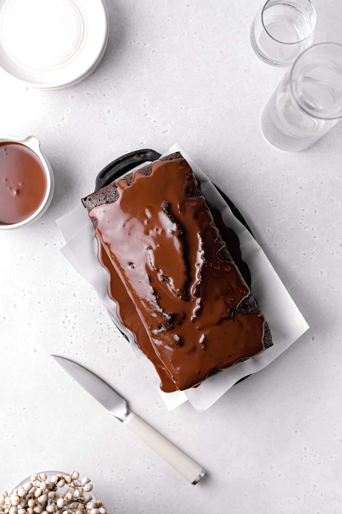 chocolate pound cake topped with a chocolate glaze.