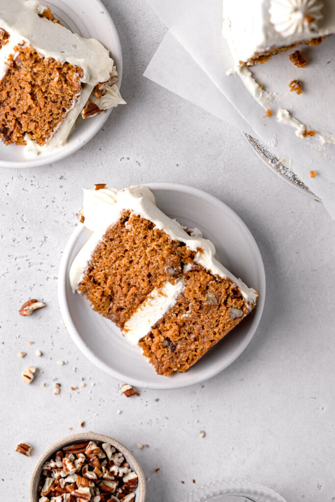 slice of small carrot cake on white plate