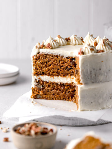 mini carrot cake with brown butter cream cheese frosting cut to reveal inside