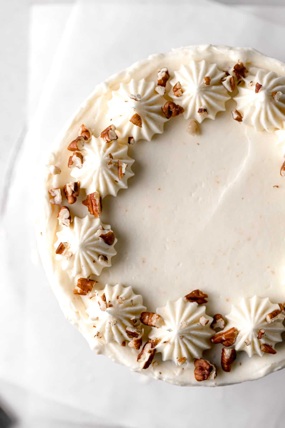 close-up of top of small carrot cake.