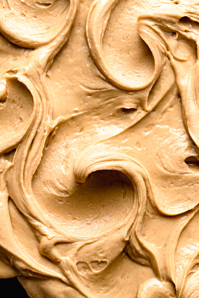 close-up shot of peanut butter frosting swirls