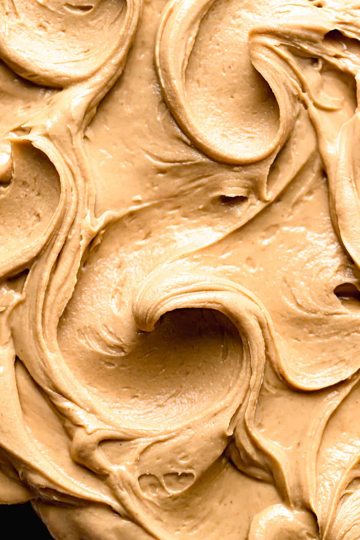 close-up shot of peanut butter frosting swirls.