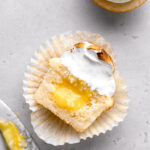 lemon meringue cupcake cut in half to show lemon curd