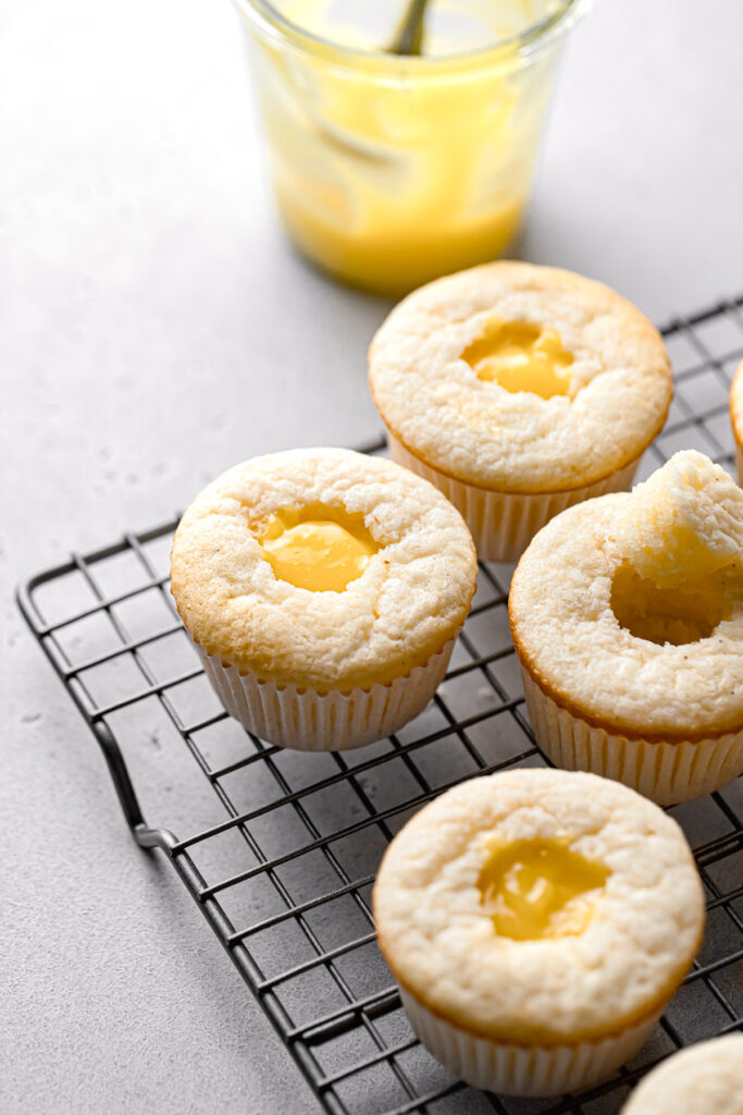 centers of cupcakes removed and filled with lemon curd