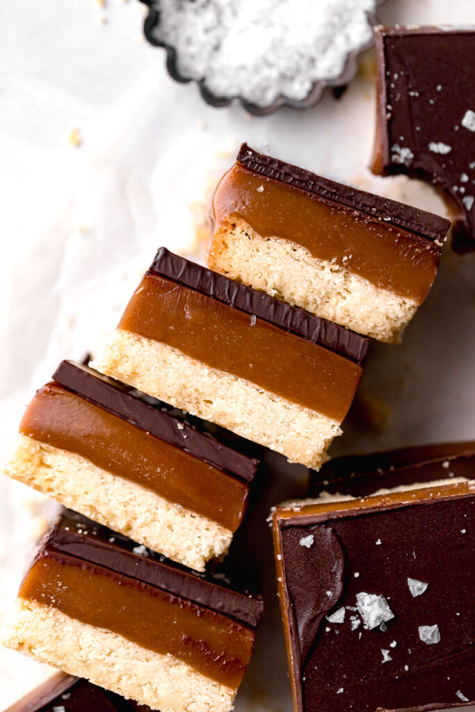 tahini caramel bars lined up on their sides