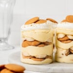 banana pudding jars on marble slab.