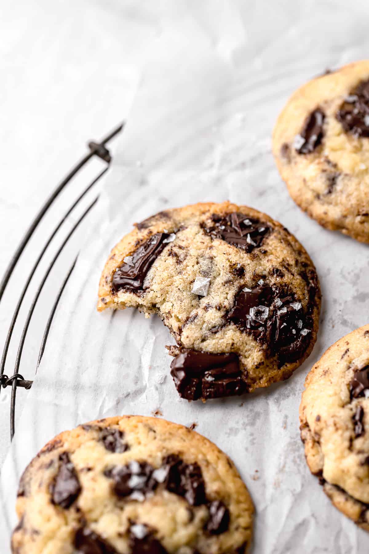 chocolate chip cookies without brown sugar on round wire rack.