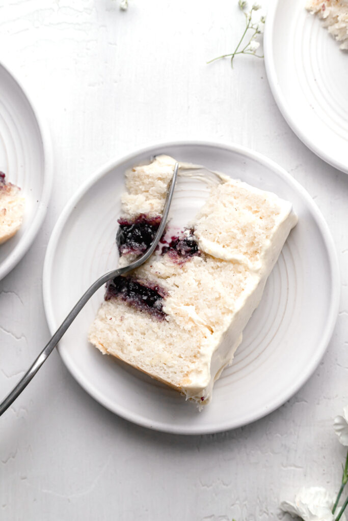 slice of blueberry jam cake on white plate