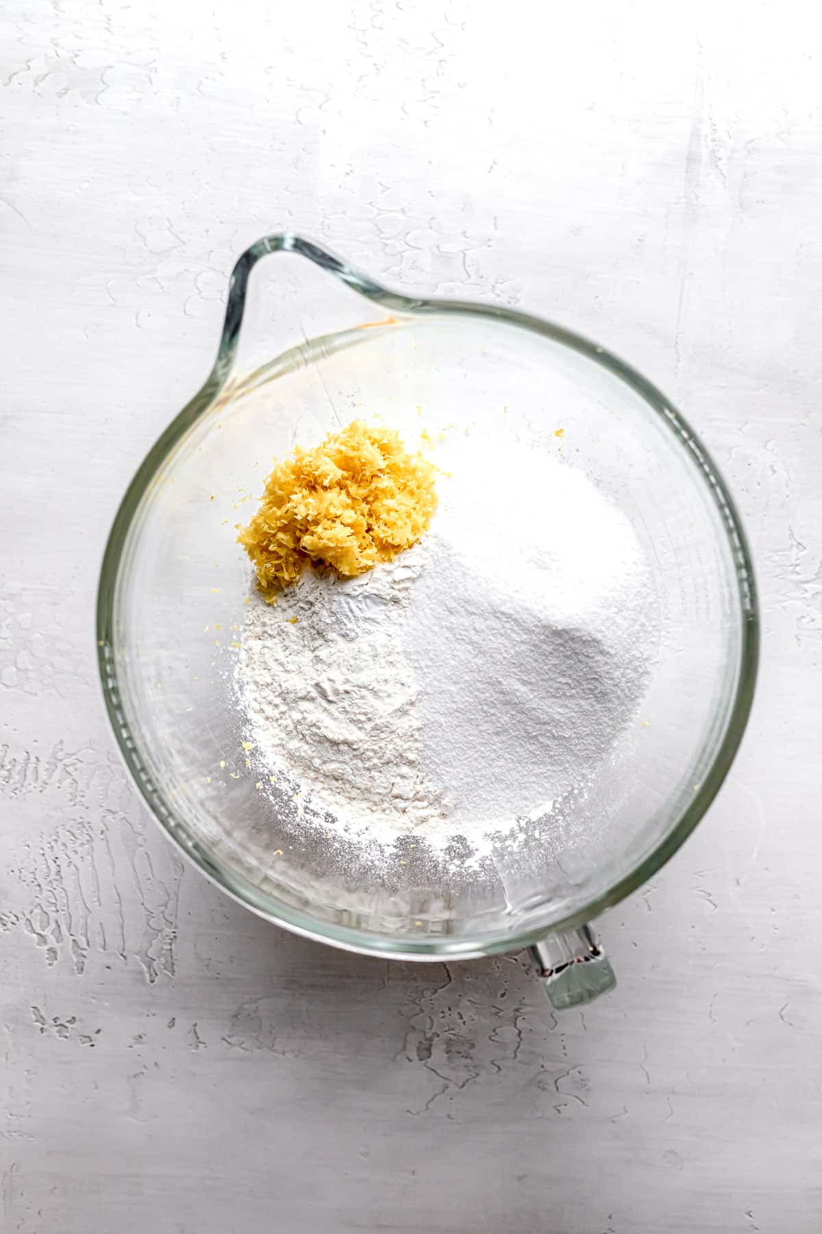 dry ingredients for cake in glass bowl.