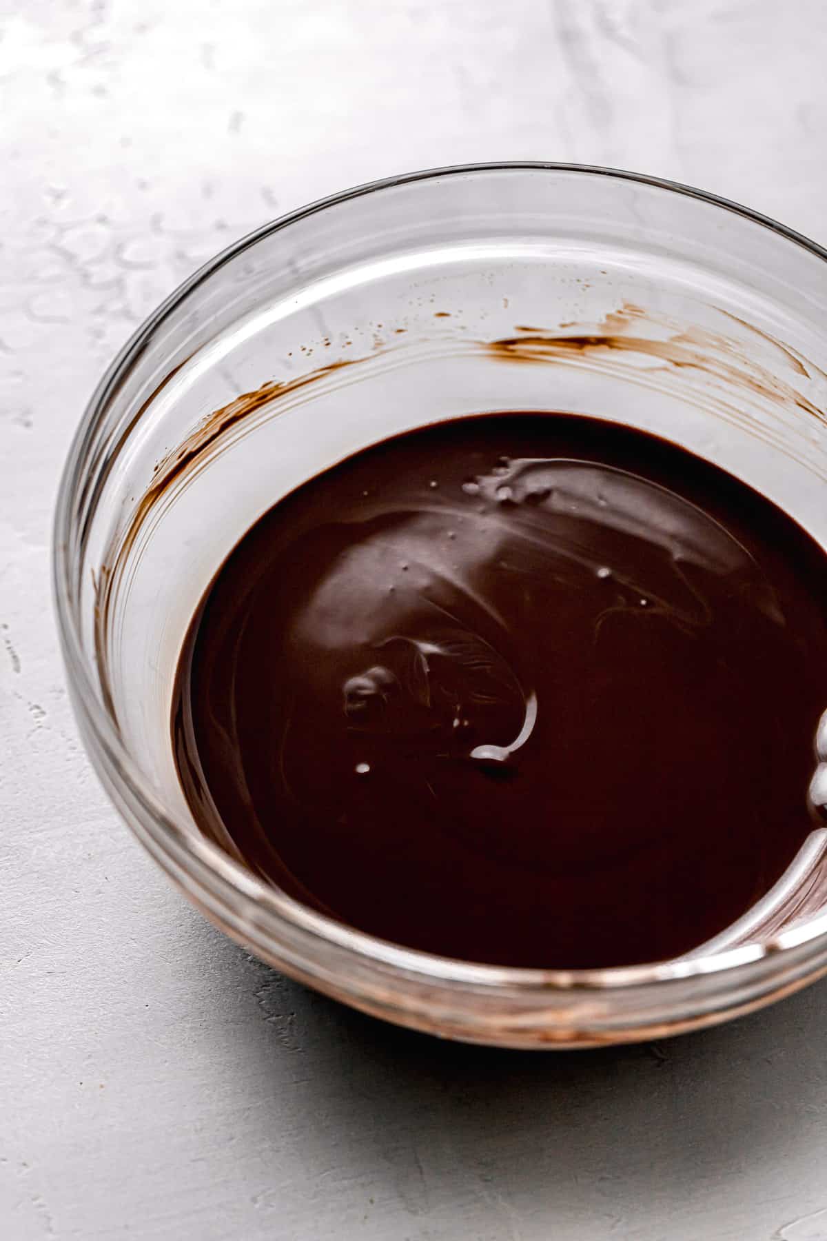 melted chocolate in glass bowl.