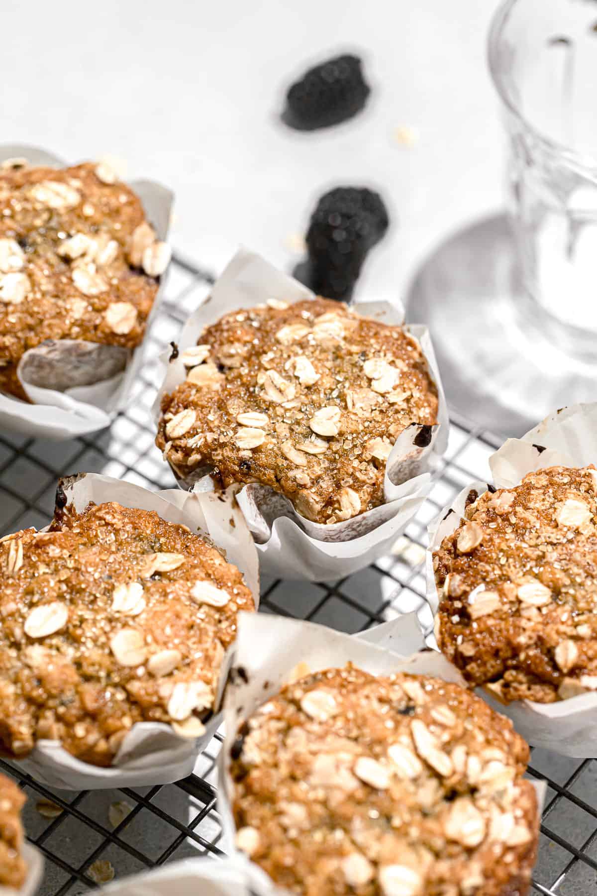 blackberry oatmeal muffins on wire rack