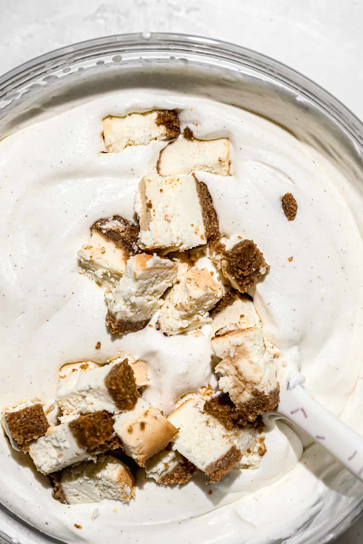 cheesecake pieces added to ice cream mixture.