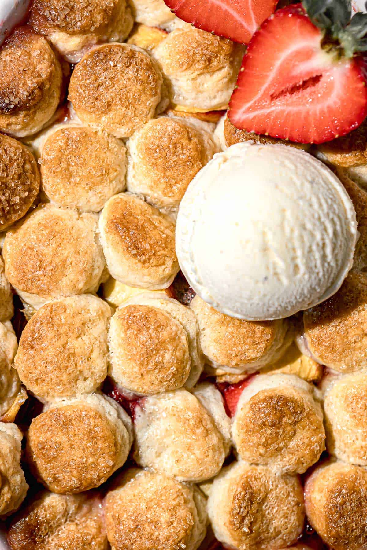 close up of cobbler with ice cream.