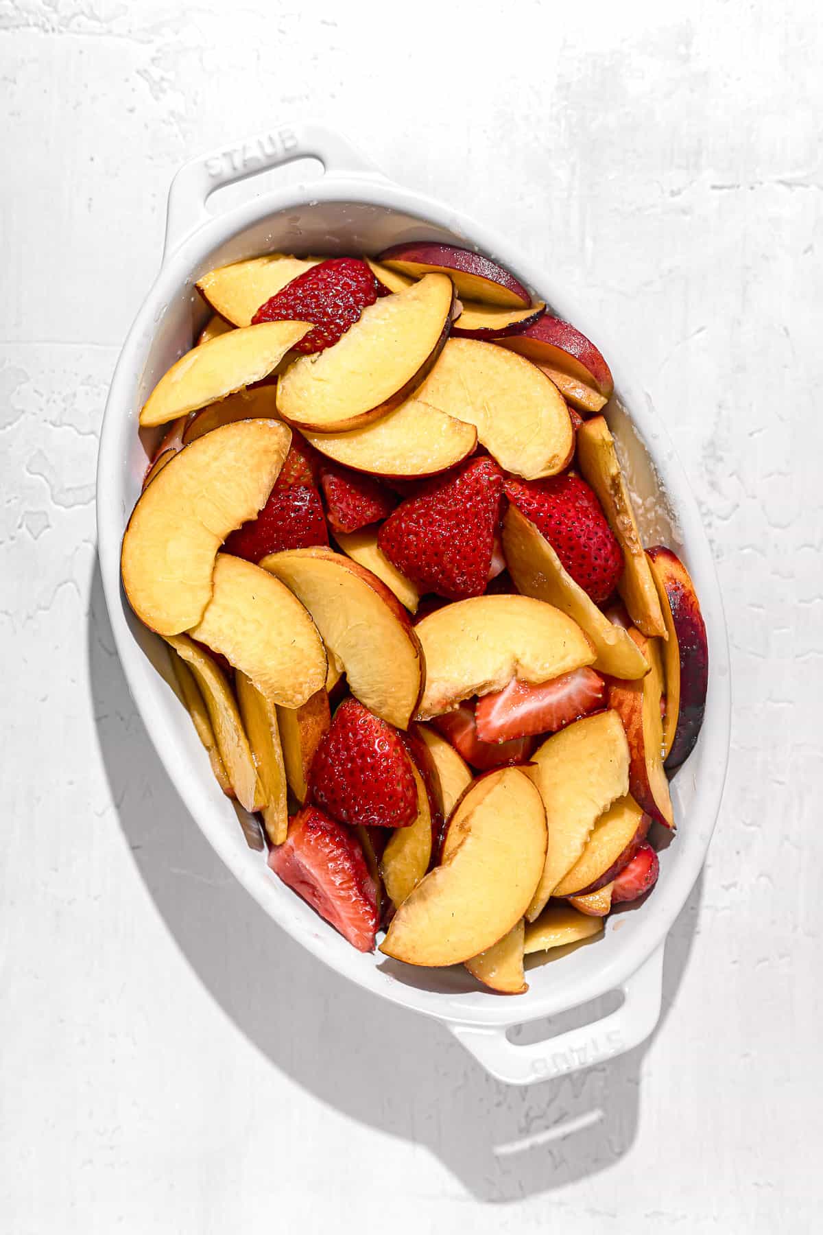 strawberry peach filling in oval dish.